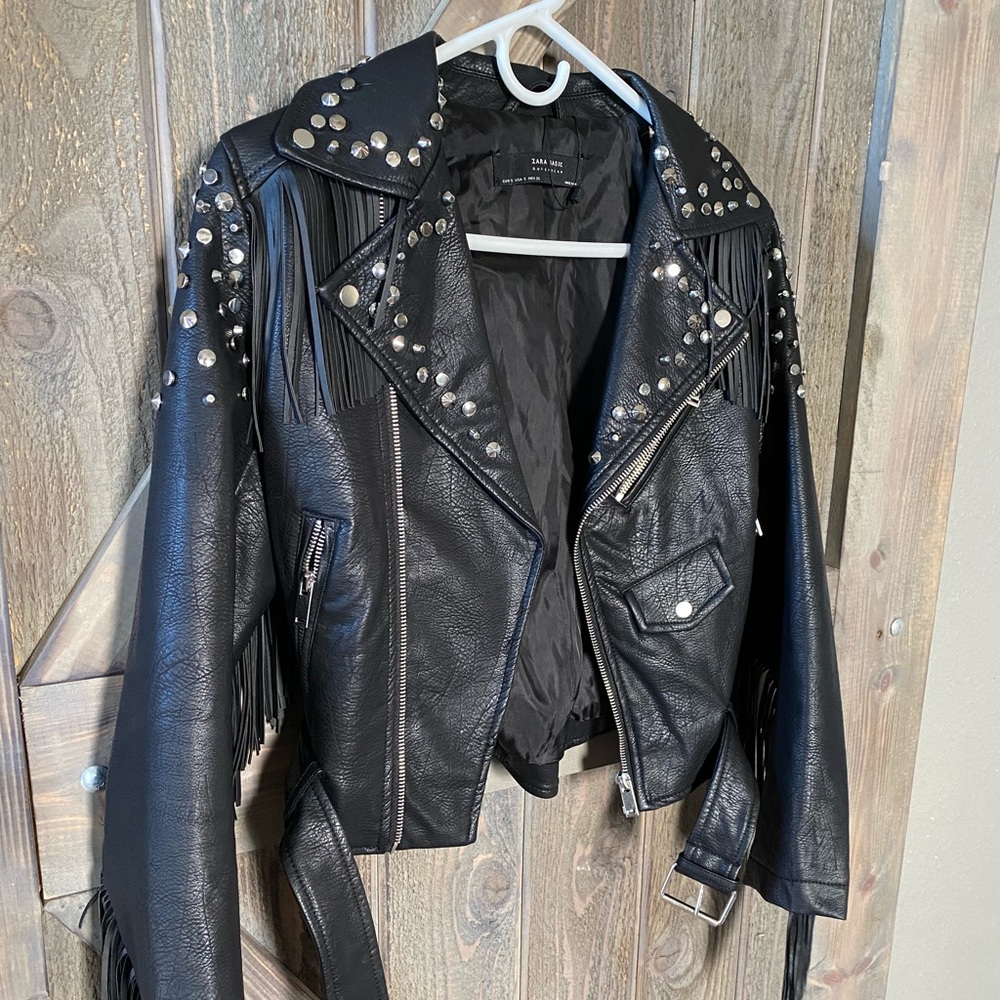 Fringe studded leather jacket.